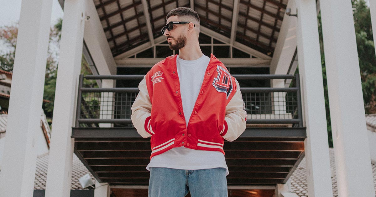 10 Pro-Level Ways To Style Your Varsity Jacket In 2023